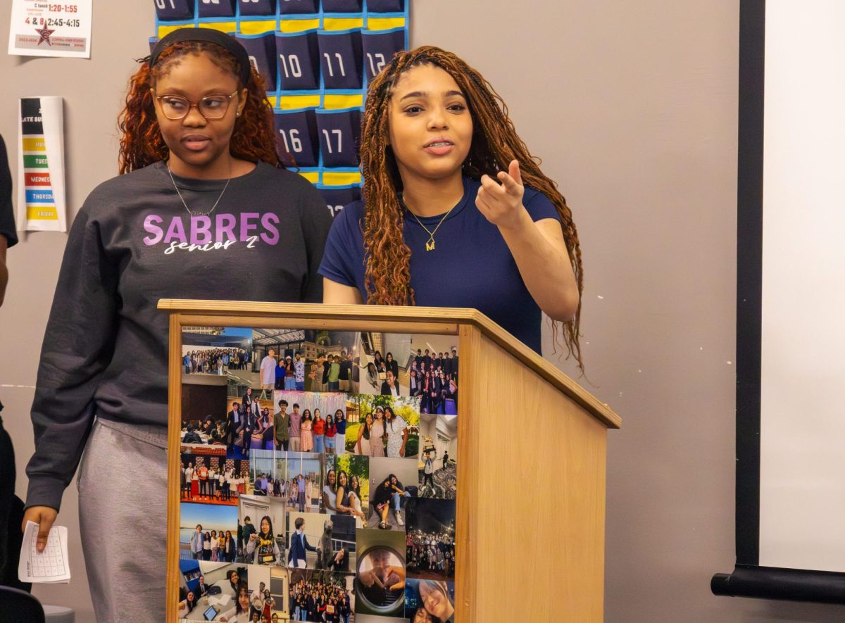 Coppell High School senior Black Student Union president Mariah Calvillo calls on a club member to discuss an answer over a historical black figure during bingo night in social studies and debate teacher SunHee Simon's room on Wednesday. Calvillo aims to make the club more inclusive for students.