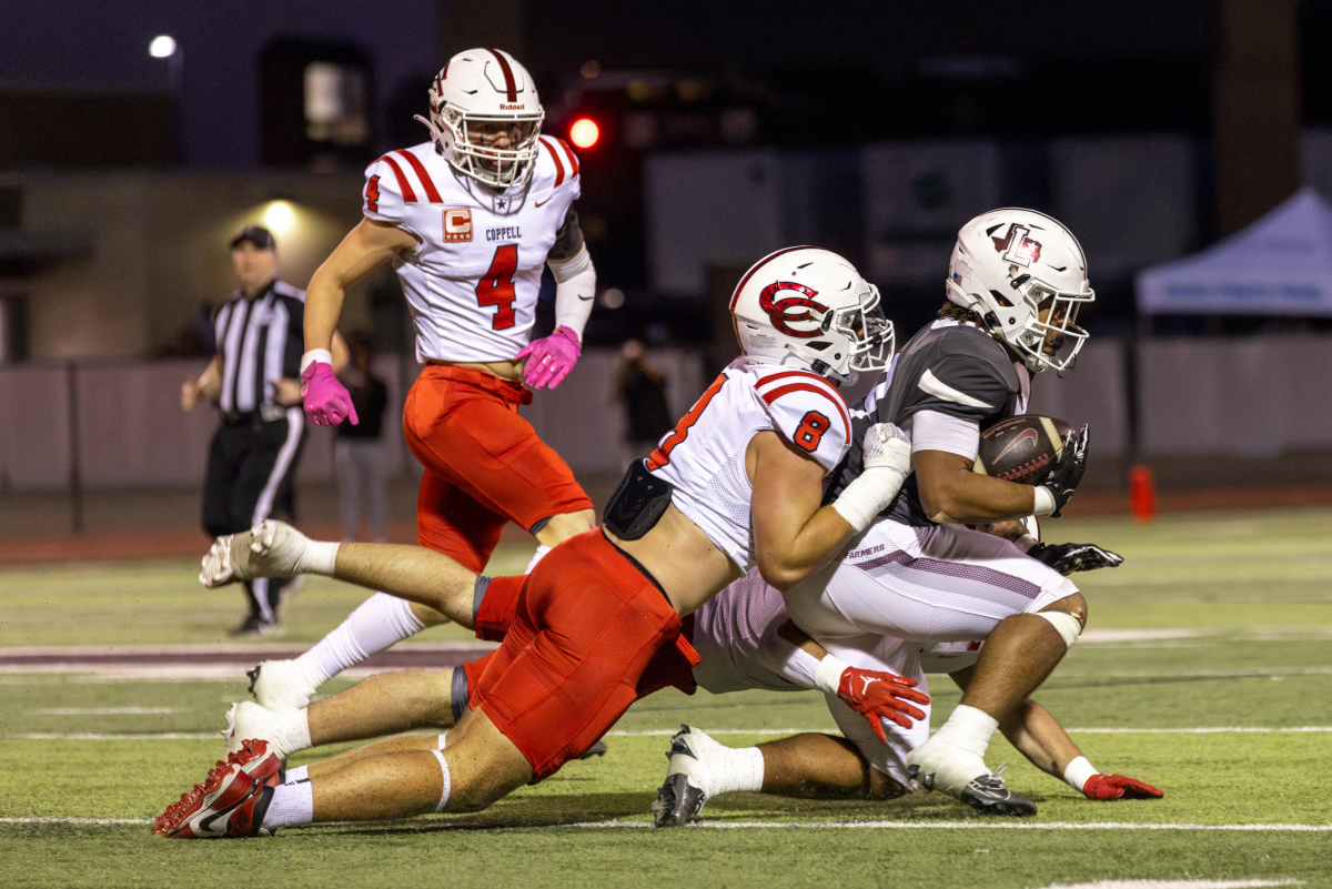 Former Coppell defensive lineman Blake Isbell tackles Lewisville senior running back Tenel Hill at Max Goldsmith Stadium on Oct. 18. The biannual UIL realignment applies to the 2026-27 and 2027-28 school years where Coppell athletics will face new district opponents. Sidekick File Photo