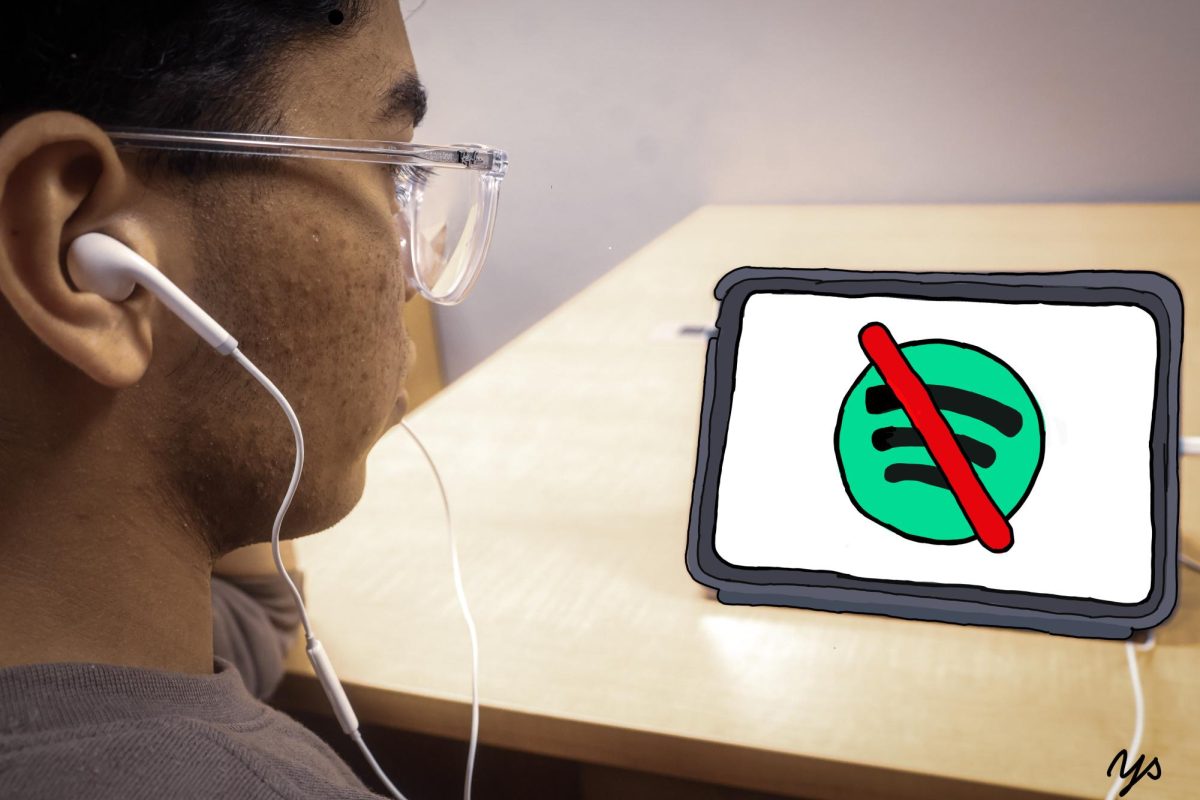 Spotify is no longer available on Coppell High School issued devices, leaving students unable to access or listen to music on the website. Spotify was restricted due to Coppell ISD following the terms of service, which state one must be 18 or above, or 13 or above with parental permission. Photo illustration by Yoshita Sanivarpu.