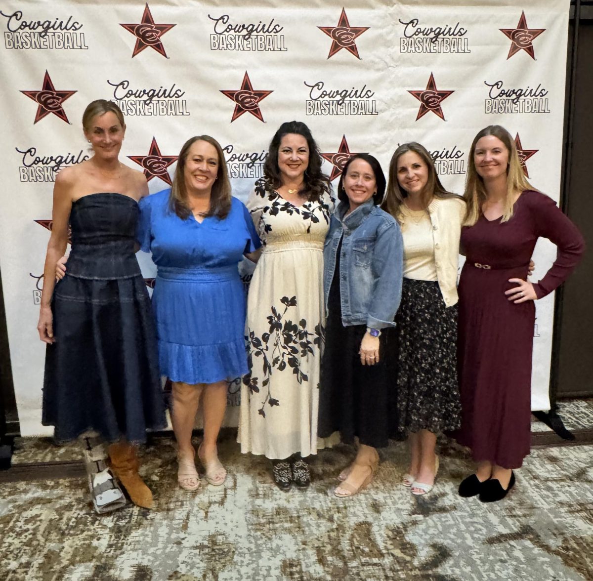 Coppell Girls Basketball Booster Club members attended the Coppell Cowgirls banquet. The booster club works behind the scenes by creating events and volunteering their time to support their students. Photo courtesy Katherine Campbell 
