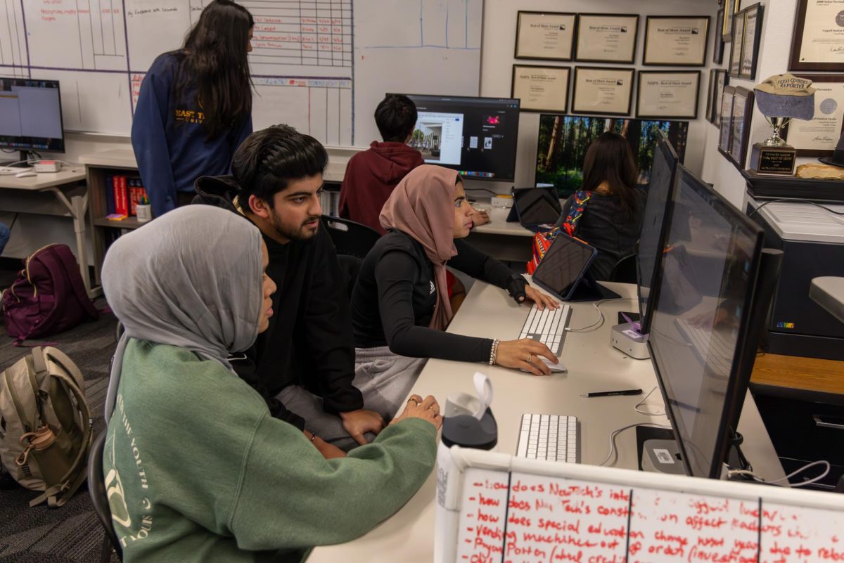 The Sidekick staff writer Yusra Khan and staff photographer work together for their stories in D115. D115 served The Sidekick staff for 22 years and will be used for another classroom after the 2025-26 school year. 