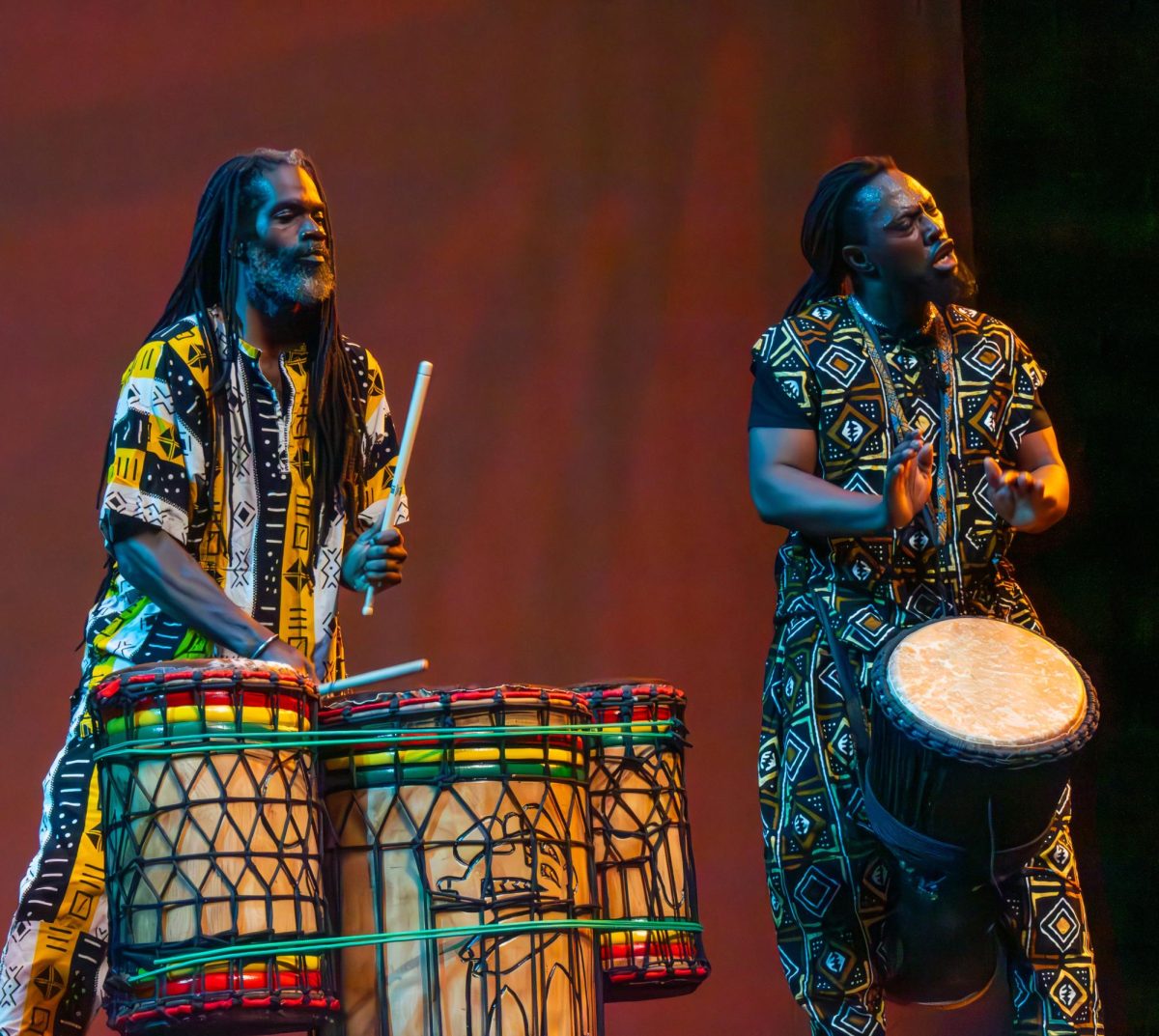 Banda Koro Africa drum and dance members Ande Jones and Edward Dogbe drum a traditional African beat on Saturday at Coppell Arts Center. The Kaleidoscope celebrated the arts and cultures from groups around the world to educate the community. 