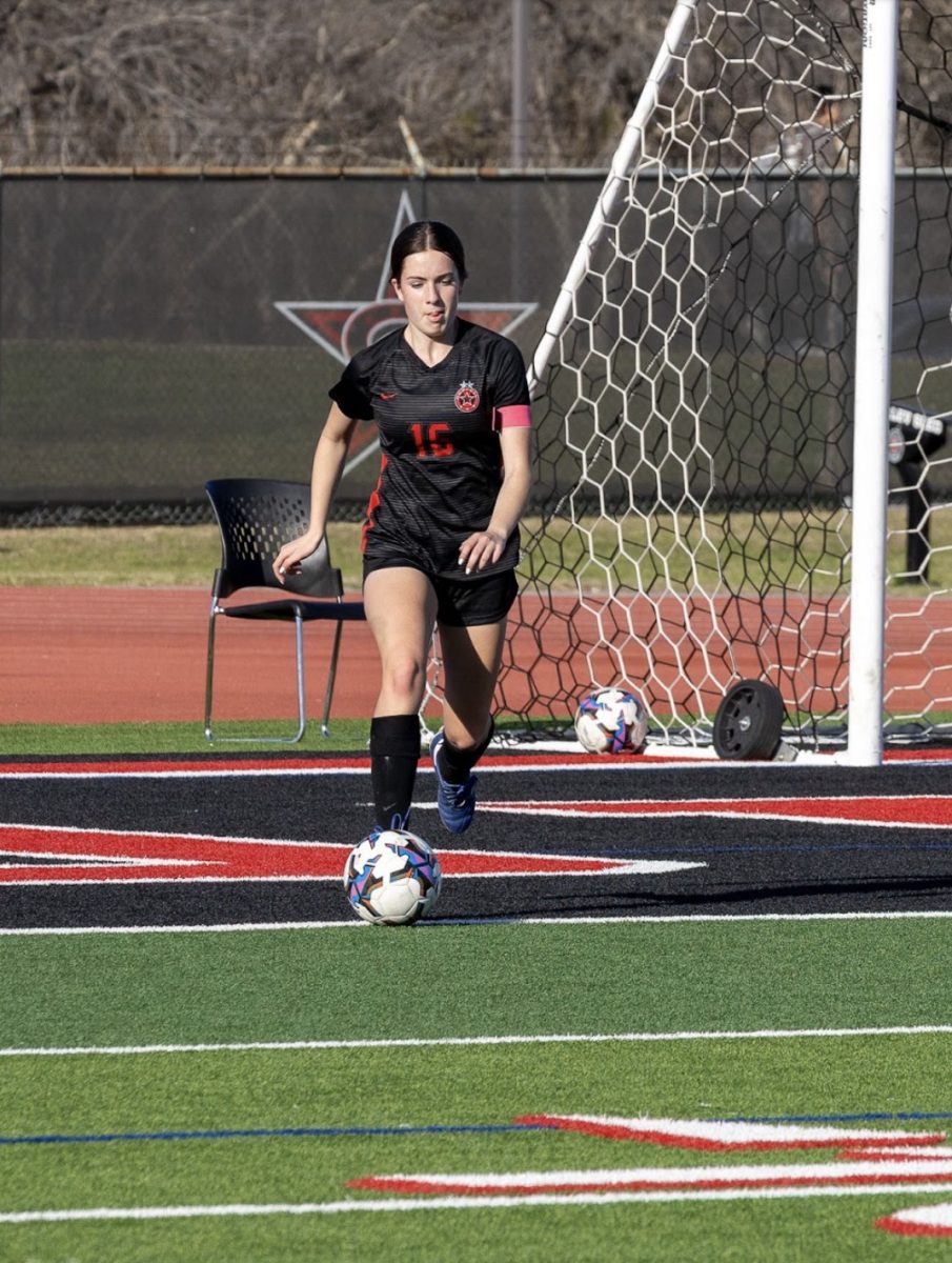 Coppell freshman centerback Brennan Ford receives a goal kick against Lewisville on Feb. 27 at Buddy Echols Field.
