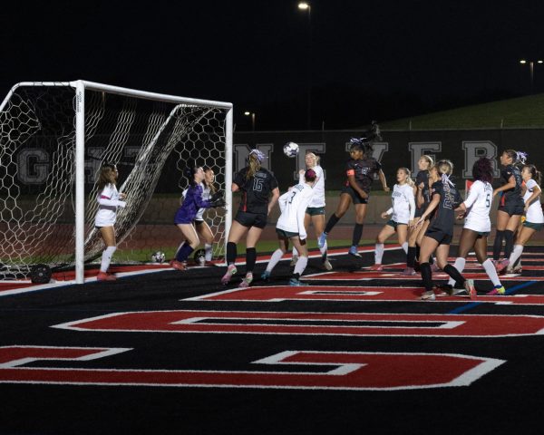 Coppell senior midfielder Rachel Mathew scores on a header on Friday at Buddy Echols Field in the Cowgirls’ 5-1 victory over Mansfield Lake Ridge in the regional semifinals. Coppell advances to play Keller at 7:30 p.m. Tuesday in the Class 6A Region I final at Keller ISD Athletics Complex. Photo by Naseeha Masood.