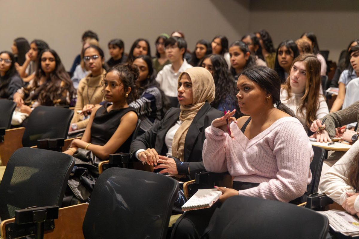 The Sidekick staff photographer Karen Mascarenhas, sports photography editor/sports social media manager Naila Ali and girls sports editor Reece Murry listen attentively to The Dallas Morning News senior food reporter Sarah Blaskovich on Feb. 17 at The Dallas Morning News. Ali reflects on her goals in life and her new path into sports media. Photo by Rachel Chio