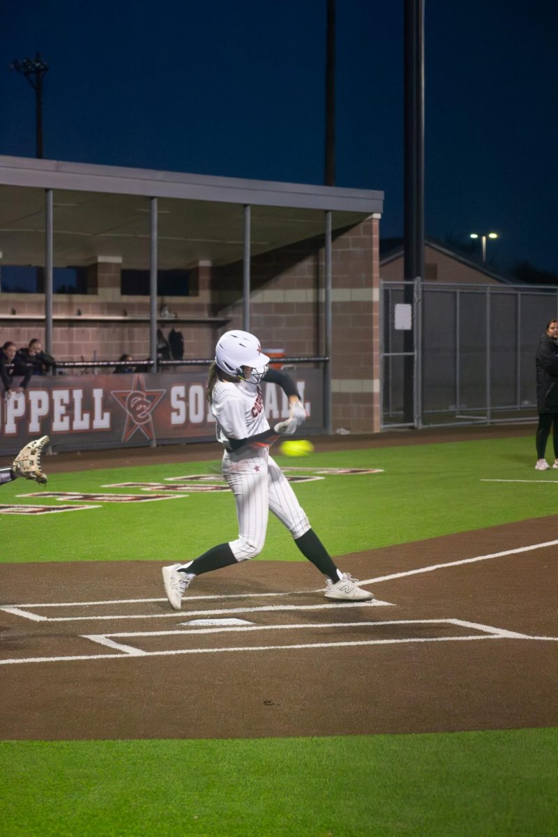 Coppell junior outfielder Cortney Hargrove bats against Hebron on March 27 at Coppell ISD Baseball/Softball Complex. The Hawks defeated the Cowgirls, 7-3.