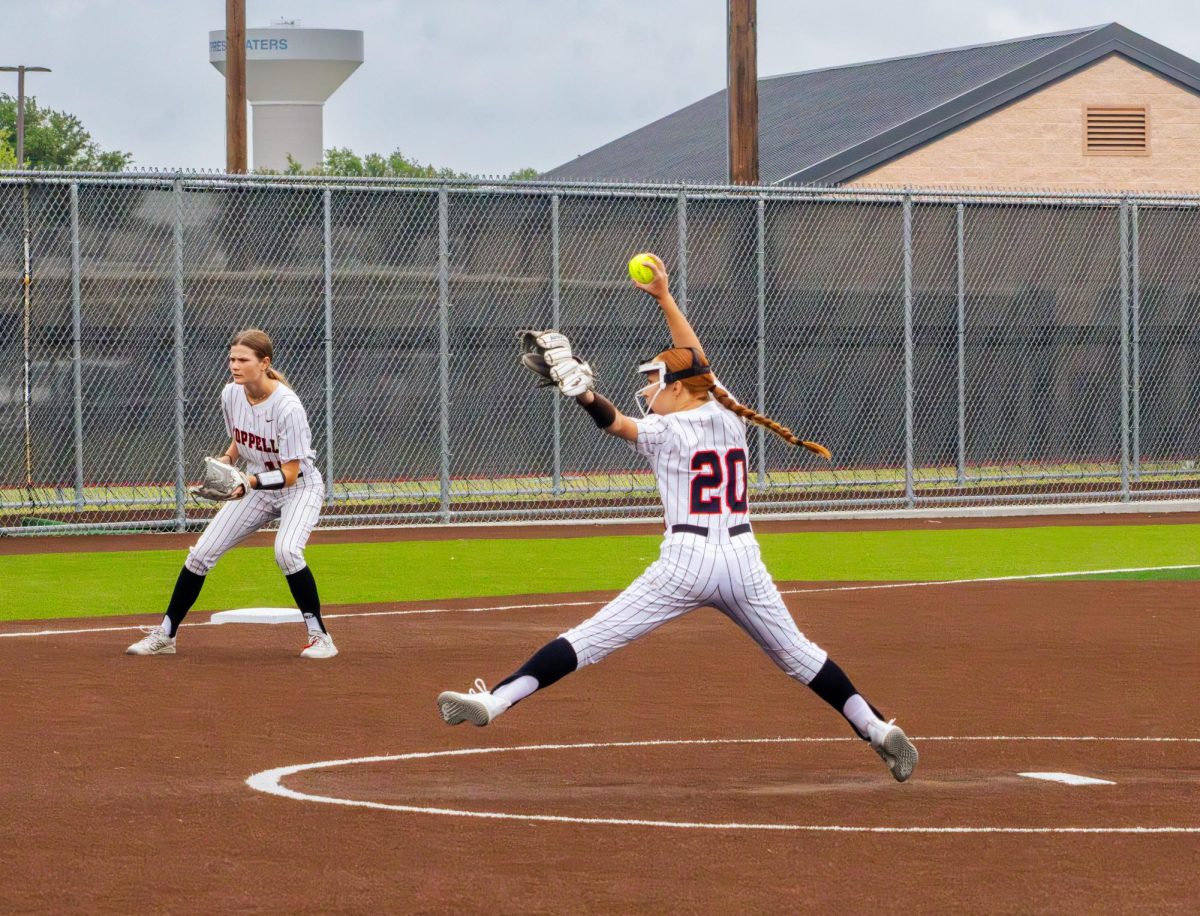 Coppell sophomore Scarlett Stephens pitches against Denton Braswell on Saturday at Coppell ISD Baseball/Softball Complex. The Cowgirls defeated the Bengals, 4-2. 