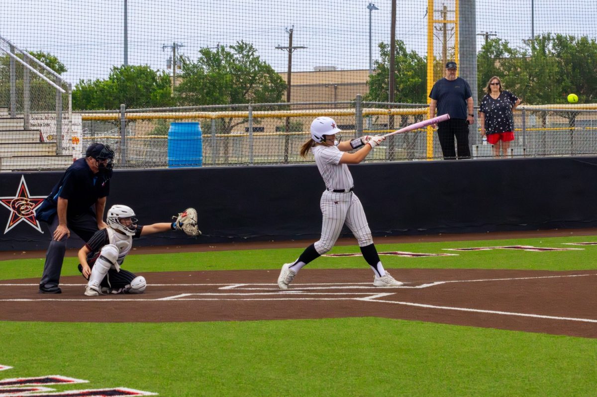 Coppell sophomore infielder Abbie Pison bats against Braswell on Saturday at Coppell ISD Baseball/Softball Complex. The Cowgirls defeated Braswell 4-2.