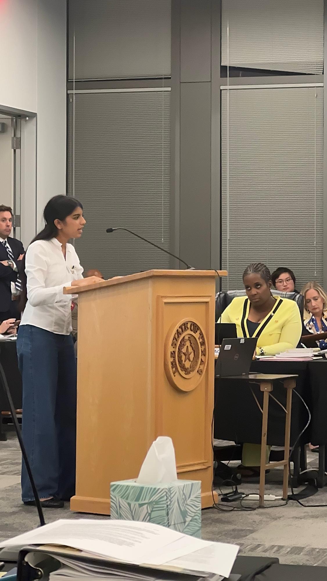 Coppell High School junior Iniya Nandakumar testifies at a State Board of Education hearing at the Barbara Jordan State Office Building in Austin on April 7. Nandakumar continues her grandfather N.S. Palanisamy’s legacy of advocating for farmers facing unfair treatment in South India. Photo courtesy Iniya Nandakumar.
