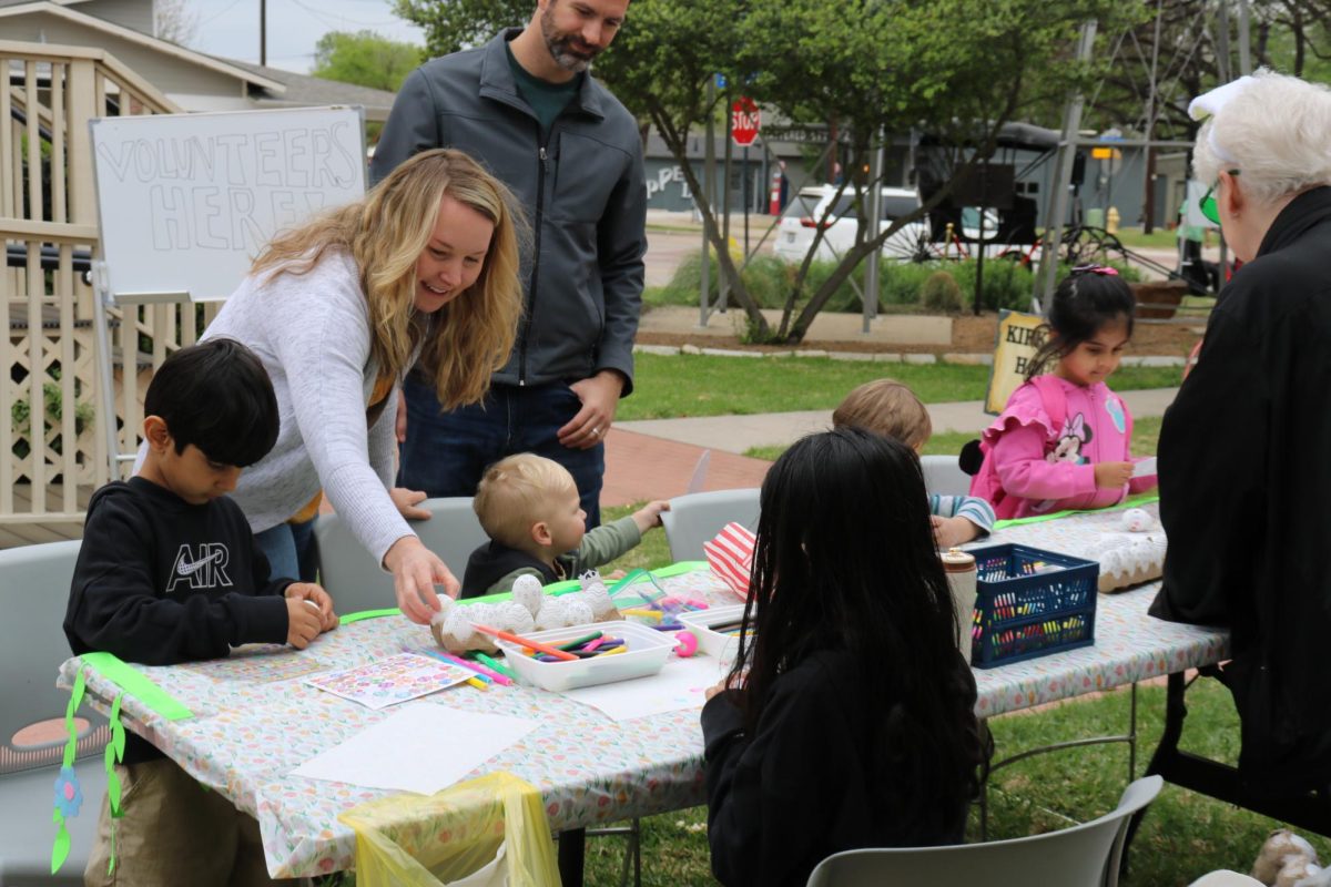 Coppell parents and children participate in Easter egg coloring during Hop Into Spring on March 28 at the Coppell Historical Museum. The Coppell Historical Society hosted Hop Into Spring, welcoming the new season with activities such as Easter egg hunting, face painting and more for all residents. 