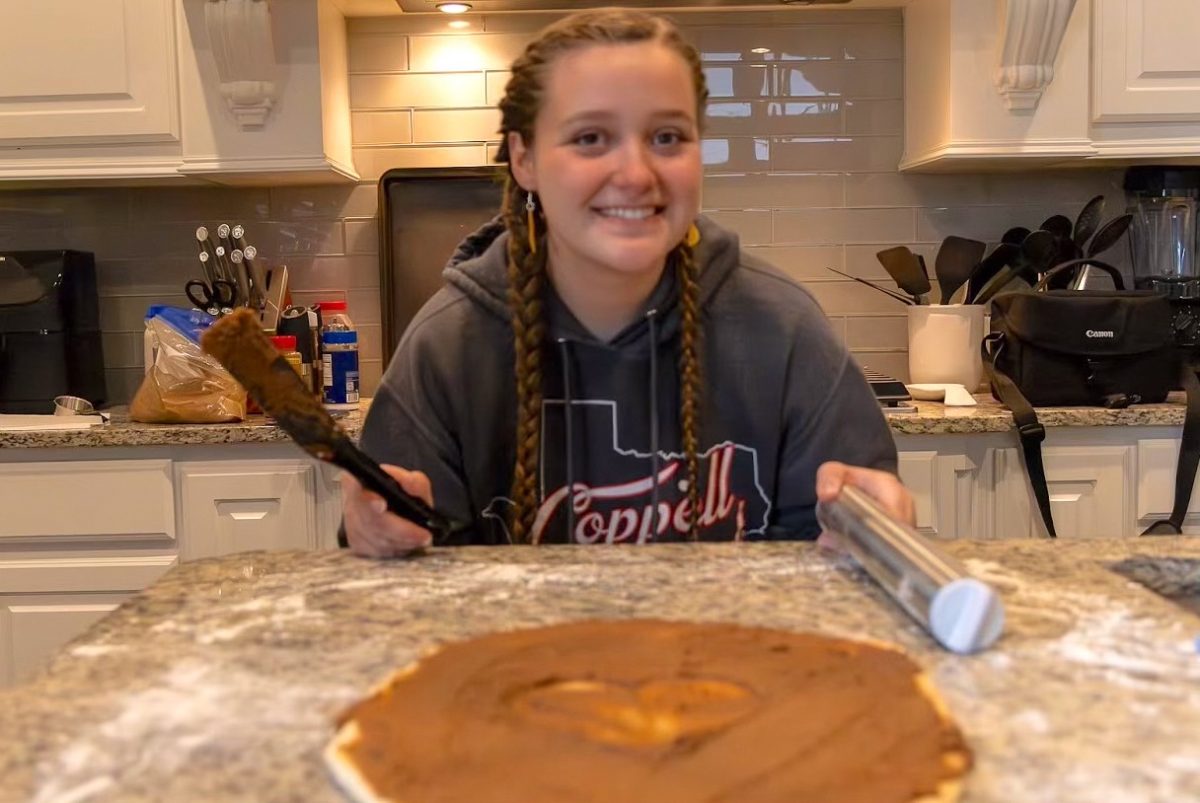 Coppell High School senior Isabella Osbaldeston bakes cinnamon rolls in her kitchen. Osbaldeston owns a side business called BellsSweetOfTheWeek, selling baked goods to friends and classmates. Karen Mascarenhas
