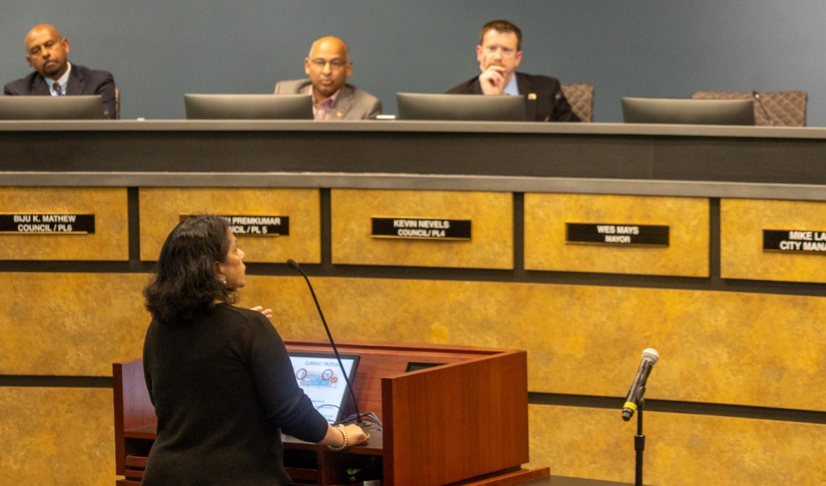 Coppell resident Genevieve Mukheriee speaks against the development of a commercial center due to its proximity to Arbor Manors on Tuesday in the Council Chambers. The Coppell City Council proclaimed the month of April as Volunteer Month and discussed a Planned Development for a commercial center on the south side of Sandy Lake Road.