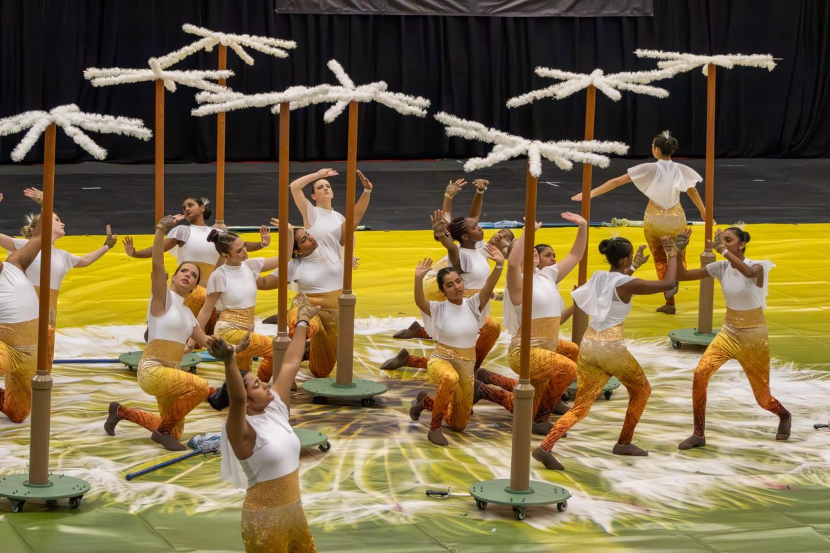 Coppell High School A Guard begins performance of “Only for You” on March 28 at CHS Arena. CHS hosted the North Texas Colorguard Association State Championship on March 28-29. 