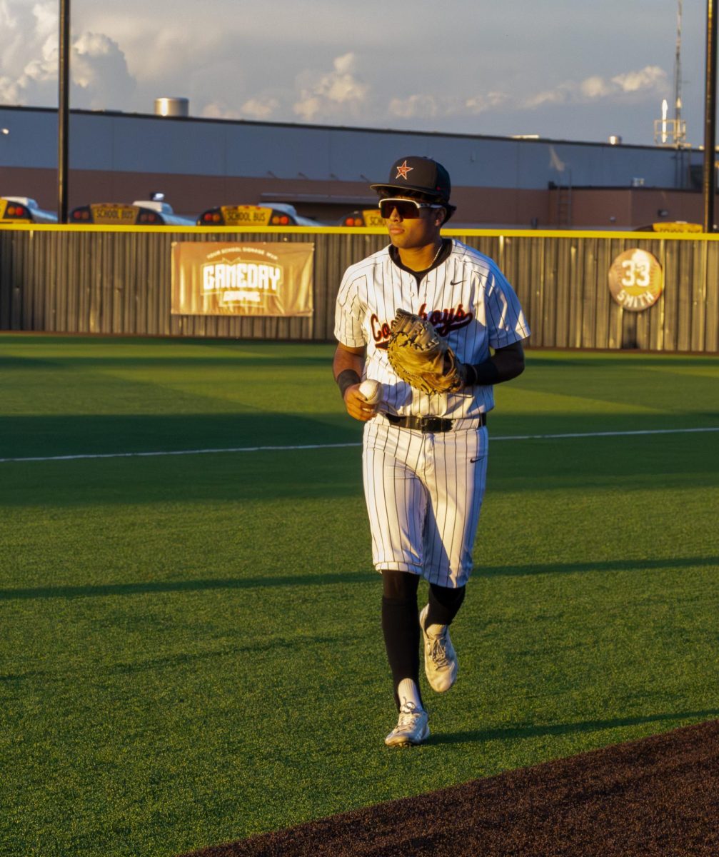 Coppell senior infielder/pitcher Jaiden Patel jogs back to the dugout against Flower Mound Marcus on April 24 at Coppell ISD Baseball/Softball Complex. Baseball has been a meaningful and formative part of Patel’s life since he began playing at age 5.