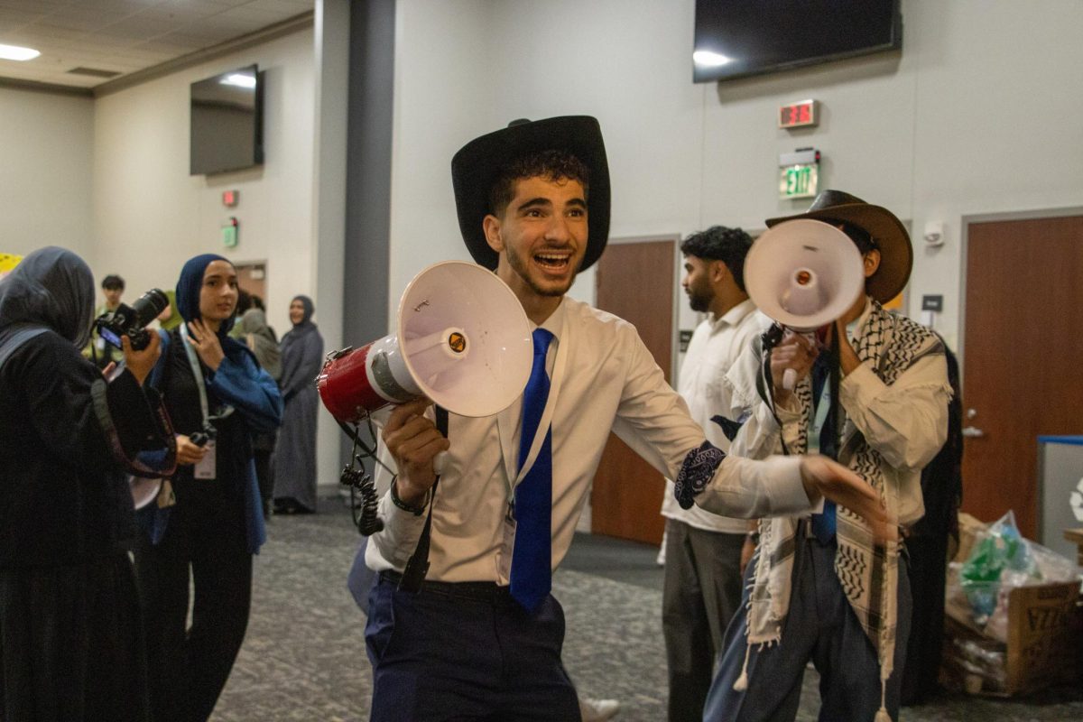 Coppell senior Mohammad Saleh encourages the Coppell Muslim Interscholastic Team (MIST) team members to participate during the regional qualifiers on April 2-5 at University of Texas at Dallas. Top five competitors compete at nationals held at St. Louis. Photo Courtesy from Zaara Shaik