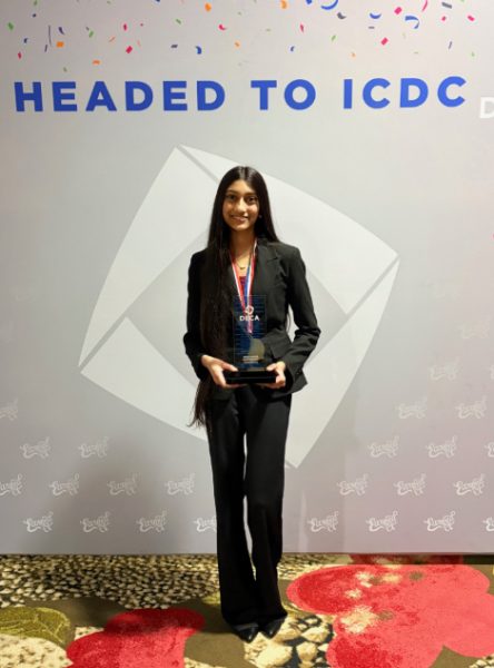 CHS9 freshman Satviki Buchipudi holds her DECA state trophy on Feb. 21 after the DECA State Career Development Conference at Hilton Anatole in Dallas. Buchipudi attended the DECA International Career Development Conference from April 25-28 using her skills from former and current extracurriculars to navigate entrepreneurship roleplay in DECA. Photo courtesy Satviki Buchipudi